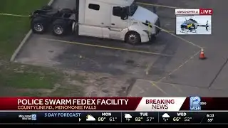Police swarm FedeEx facility