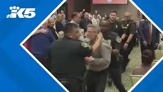 Police use stun gun on protesters at Marjorie Taylor Greene town hall