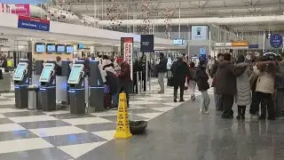 Post-Thanksgiving travel still impacted by delays, new storms