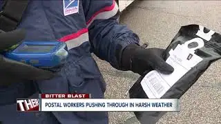 Postal workers battle cold to deliver mail