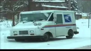 Postal workers battle snowy conditions to deliver mail