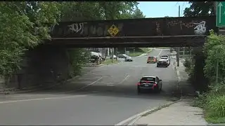 Preventing tractor trailers from getting stuck under bridges