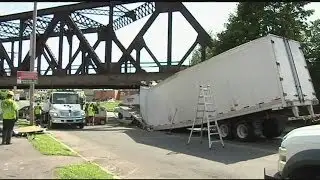 Preventing trucks from getting stuck under bridges