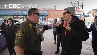 Protesters confront ICE agents conducting Minneapolis immigration crackdown