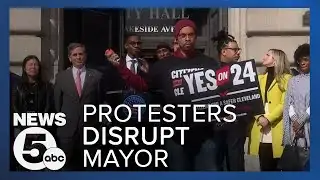 Protesters disrupt mayor
