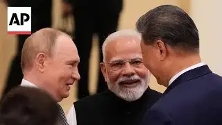 Putin and Modi meet Xi in China at SCO summit