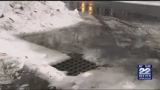 Rain, melting snow causing minor street flooding