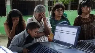 Rare twin storms batter Mexico leaving over 30 dead