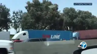 RAW VIDEO: 8 big rigs involved in chain-reaction crash on 60 Freeway | ABC7
