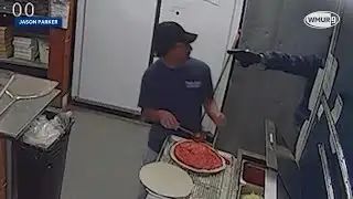 Raw video: Armed robbery at New Hampshire pizza shop