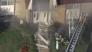 Raw video: Crews battle Baltimore apartment fire