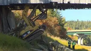 RAW Video: Excavator damages New Brunswick covered bridge