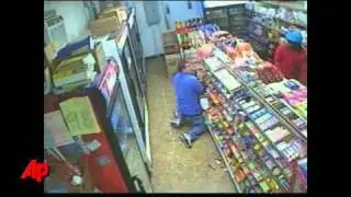 Raw Video: Shootout With Store Robbers