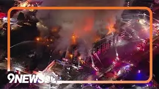 Raw video: Sky9 flies over large fire at Denver construction site