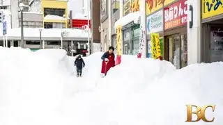 Record-breaking snow blankets Japan, killing at least 30 people