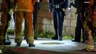 Rescue Crews Work to Remove Copper Wire Theft Suspect From Manhole