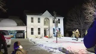 Resident discovers home with 2 cats inside is on fire