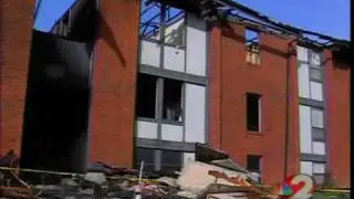 Residents clean up after apartment fire