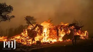 Residents flee as wildfire spreads like lightning