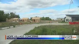 Residents outside of Hope Village asking for changes in project