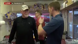 Robinson Miles talks to Central United Methodist booth