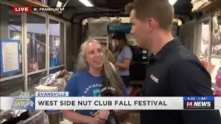 Robinson Miles talks with the Youth Resources booth