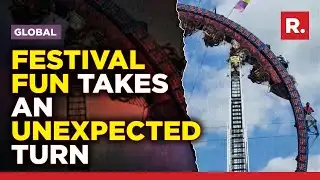 Roller coaster riders left hanging upside down