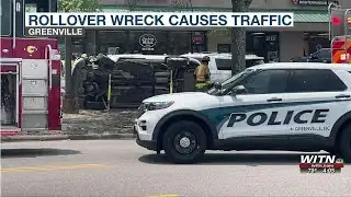 Rollover wreck snarls afternoon traffic