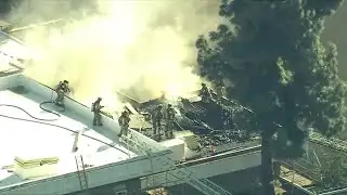 Rooftop fire erupts on school campus in LA