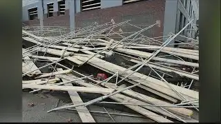 Scaffolding collapses on top of multiple vehicles downtown