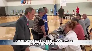 Sec. Simon visits polls, encourages people to vote