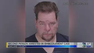 Second person arrested in embezzlement case