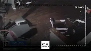 Security camera catches moments thief rips ATM through barbershop storefront