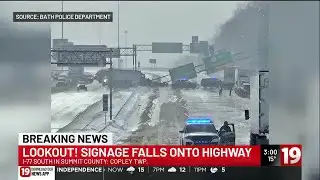 Semi-truck crash knocks down overhead sign on I-77