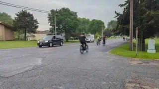 Senator Brad Pfaff joins the morning commute on bike paths with students