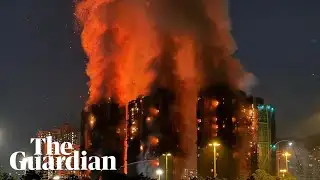 Several people trapped as fire engulfs residential complex in Hong Kong