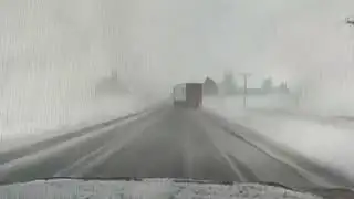 Sheriffs Dashcam Captures Semi Truck Sliding Down Slippery Highway