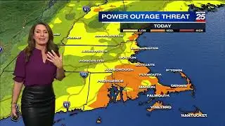 Shiri Spear in a leather skirt and purple top