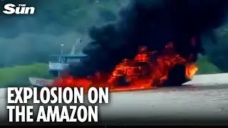 Shocking moment two burning boats float down the Amazon River in Brazil