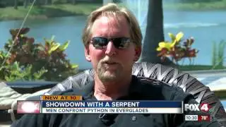 Showdown with a serpent, two men spot huge python on side of the road