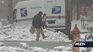 Sidewalks across Louisville remain covered in snow and ice