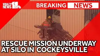 SKY 11 over rescue of worker trapped in elevated sand hopper