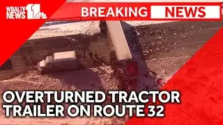 SKY 11: Overturned tractor-trailer blocks Route 32