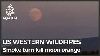 Smoke from US western wildfires turns full moon orange