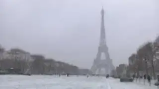 Snow dusts Paris landmarks as cold spell hits