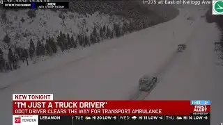 Snow plow driver clears the way for transport ambulance