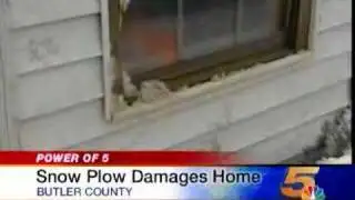 Snow Plow Sends Debris into Home