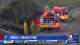 Sparks from passing train causes small grass fire