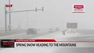 Spring snow coming down near the tunnel