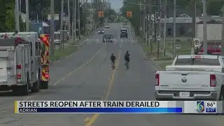 Streets reopen after train derailed